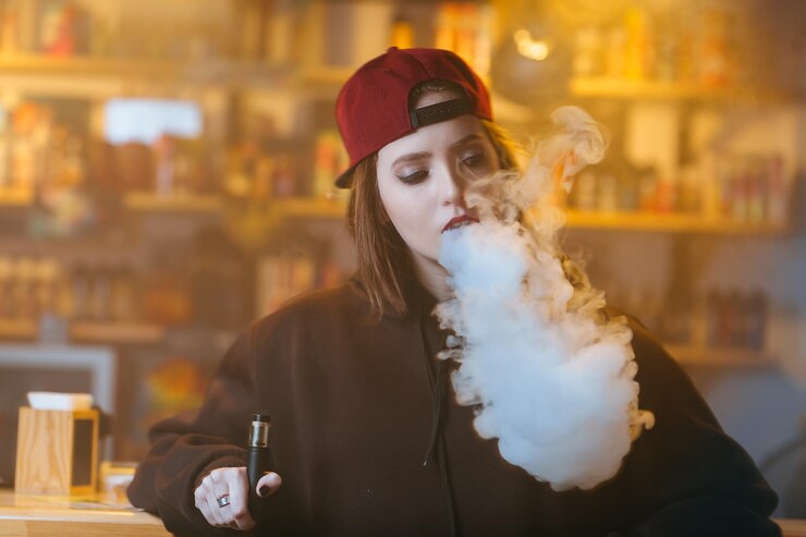 a girl smoking vape